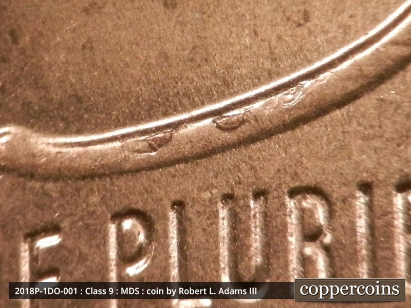 Die-stage B marker on 2018P•1DO•001 (2018 Doubled Die Obverse).