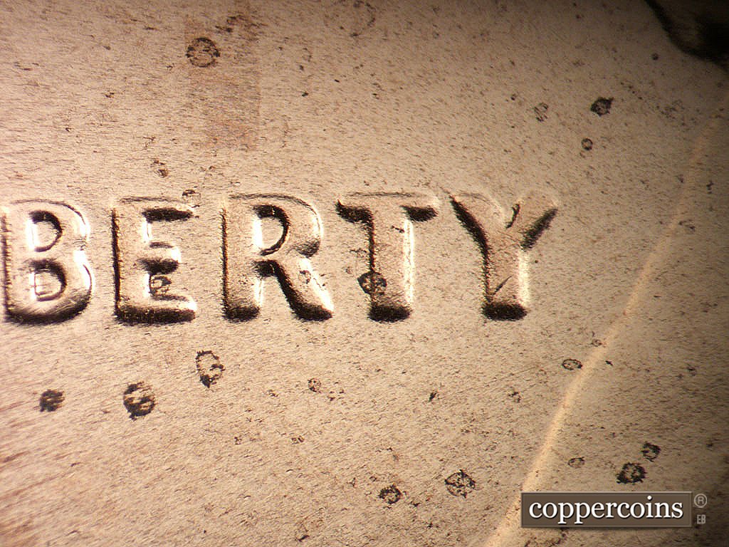 Die-stage B marker on 2019P•1DO•001 showing Extra thickness on BERTY in LIBERTy.