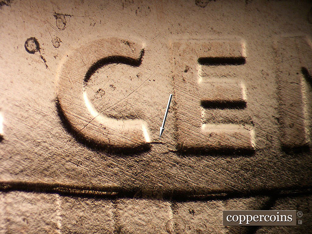 Die-stage B marker on 2019P•1DO•001 showing Die crack from C to E in CENT.