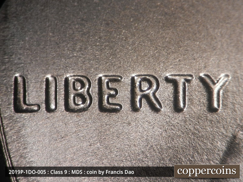 2019 Lincoln cent obverse, CopperCoins die 2019P•1DO•005 — Doubling shows as mild extra thickness toward the lower left in the last half of LIBERTY. Doubling shows especially w….