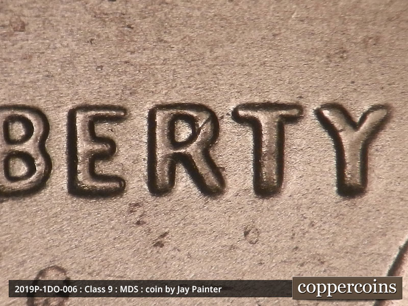 2019 Lincoln cent obverse, CopperCoins die 2019P•1DO•006 — An easily noticable spread on LIBERTY. The left arm of the Y is slightly wider than the left arm.