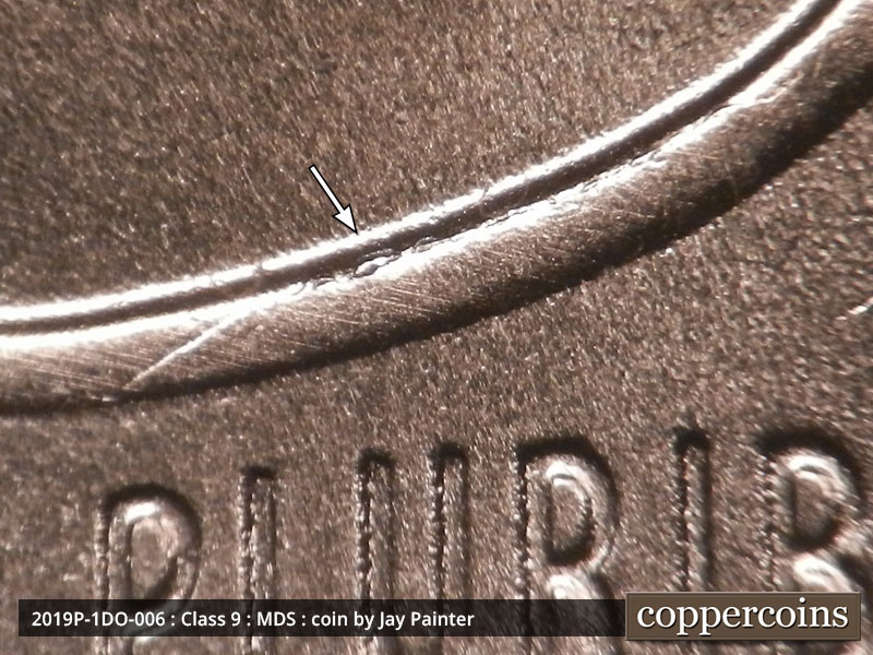 Die-stage B marker on 2019P•1DO•006 showing Die chip on the top left of the shield.