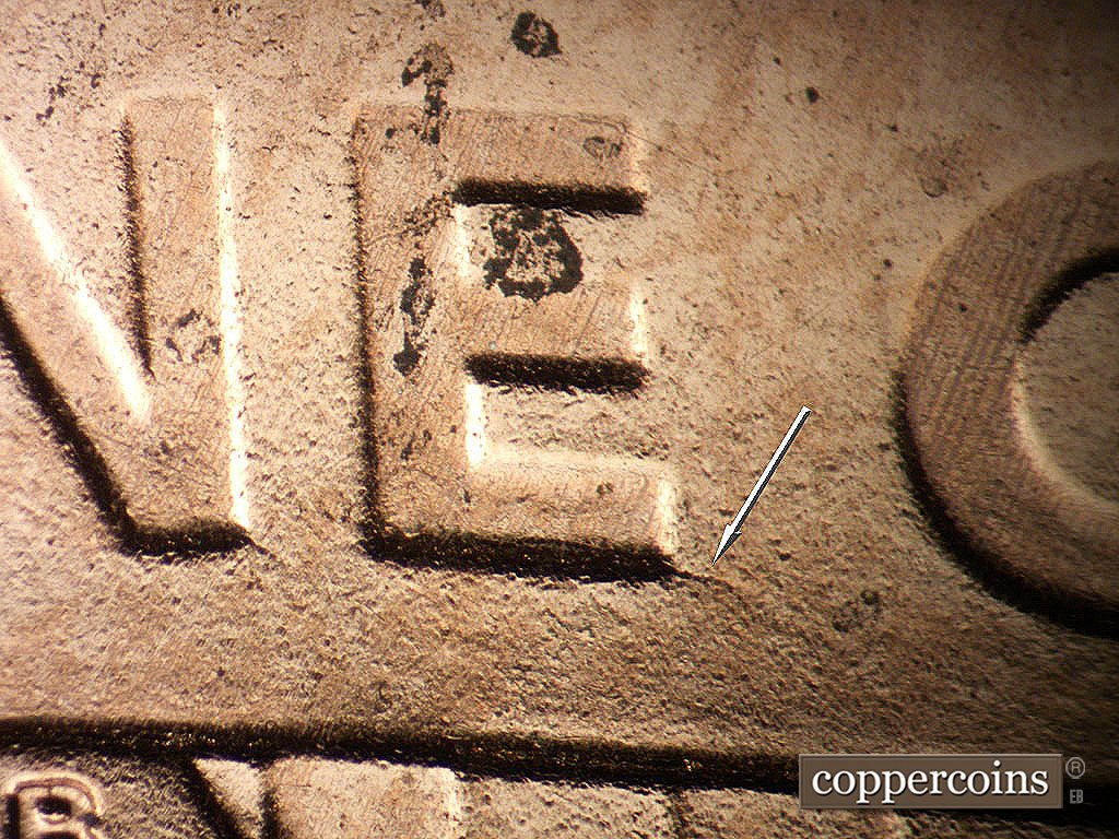 Die-stage B marker on 2019P•1DO•011 showing Die crack from lower E in ONE.