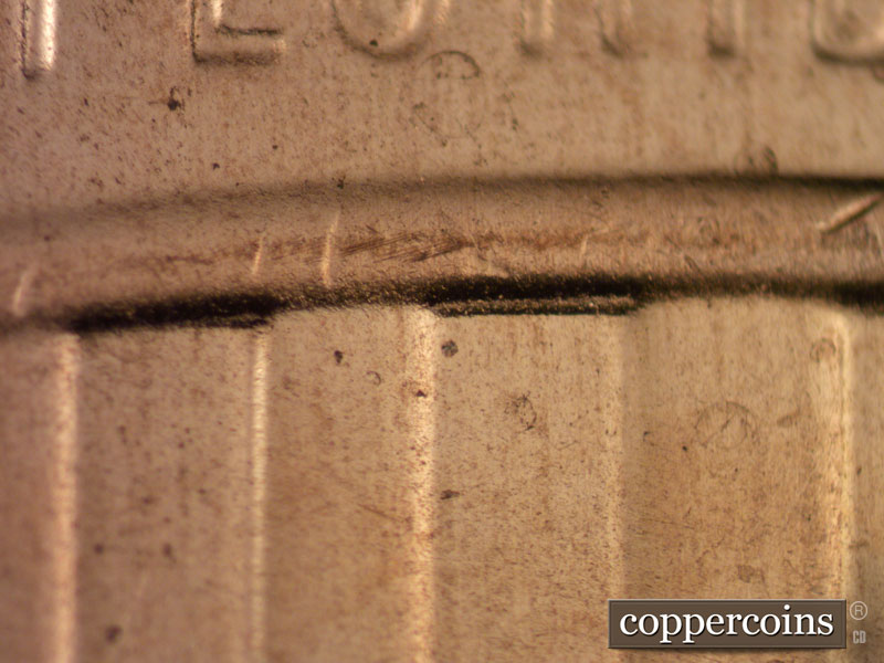 2020 Lincoln cent obverse, CopperCoins die 2020D•1DR•001 — Separation with extra parts of a crown base to the south of the primary crown base show at the tops of stripes 3, 5,….