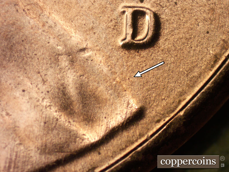 Die-stage B marker on 2020D•1DR•001 showing A heady die dot shows in the field to the south of the mint mark.