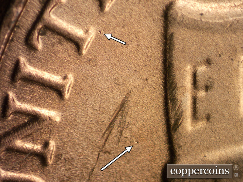 Die-stage B marker on 2020D•1DR•002 showing Die dot near the base of the T of UNITED.