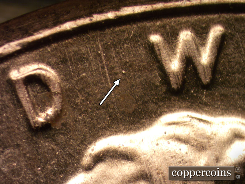 Die-stage B marker on 2020D•1DR•004 showing A heavy die dot shows between the D and W in the motto.