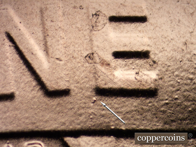 Die-stage B marker on 2020P•1DO•002 showing Die dot under N in ONE.