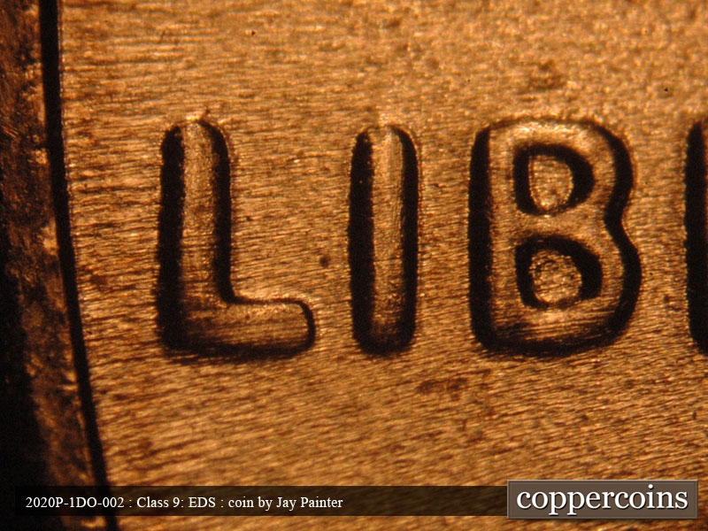 Die-stage C marker on 2020P•1DO•002 showing LIB.