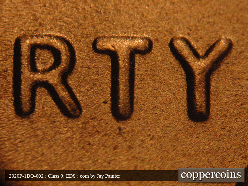 Die-stage C marker on 2020P•1DO•002 showing Mild doubling of TY in LIBERTY.