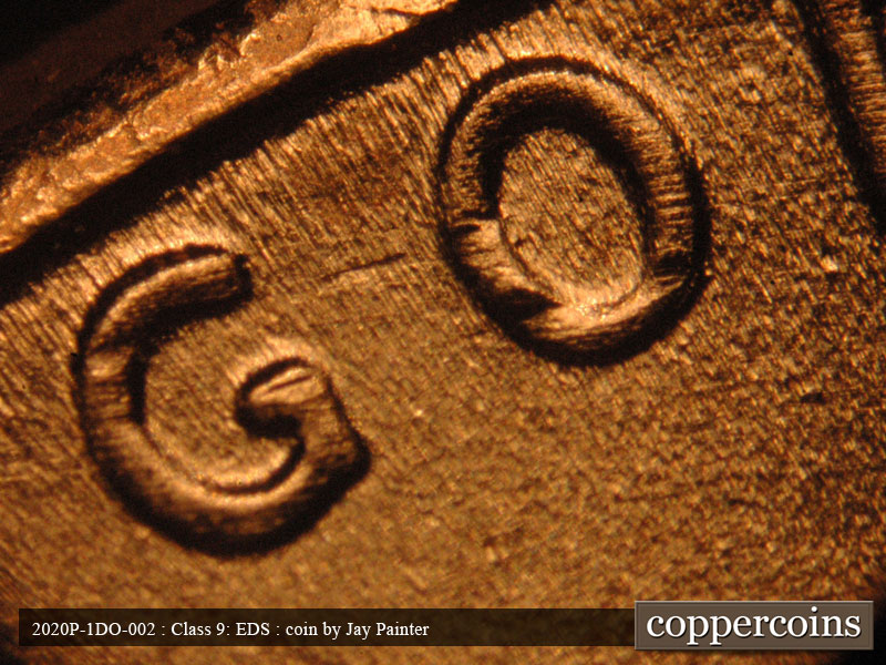 Die-stage C marker on 2020P•1DO•002 showing Small die dot between GO in GOD.