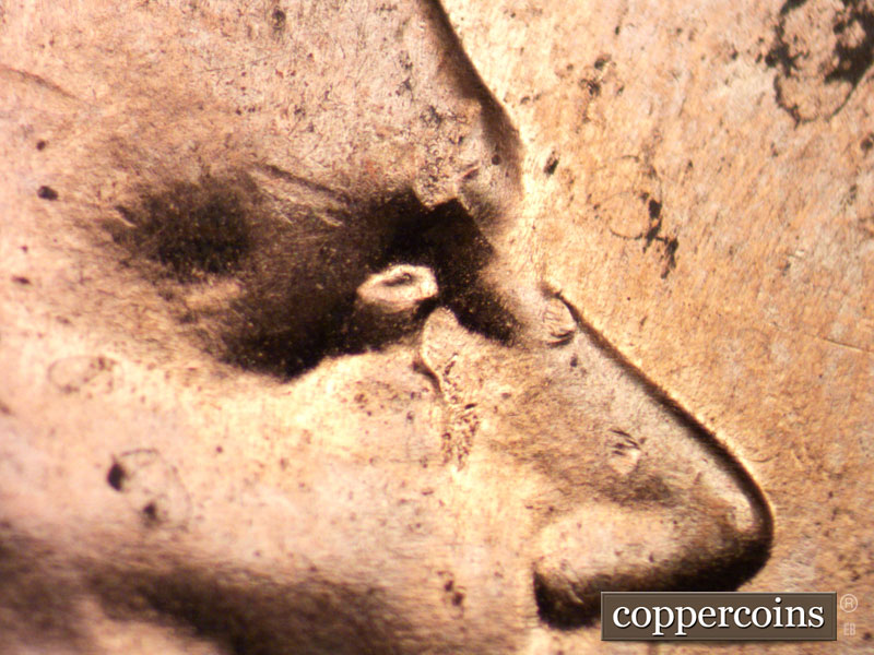 Die-stage C marker on 2021P•1DO•002 showing Die crack on bow.