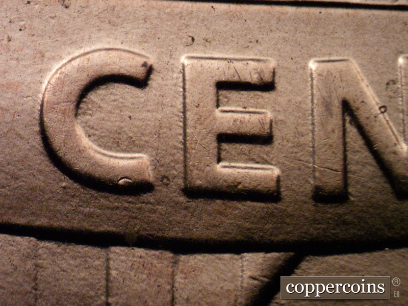 Die-stage C marker on 2021P•1DO•003 showing Die dot near C in CENT.