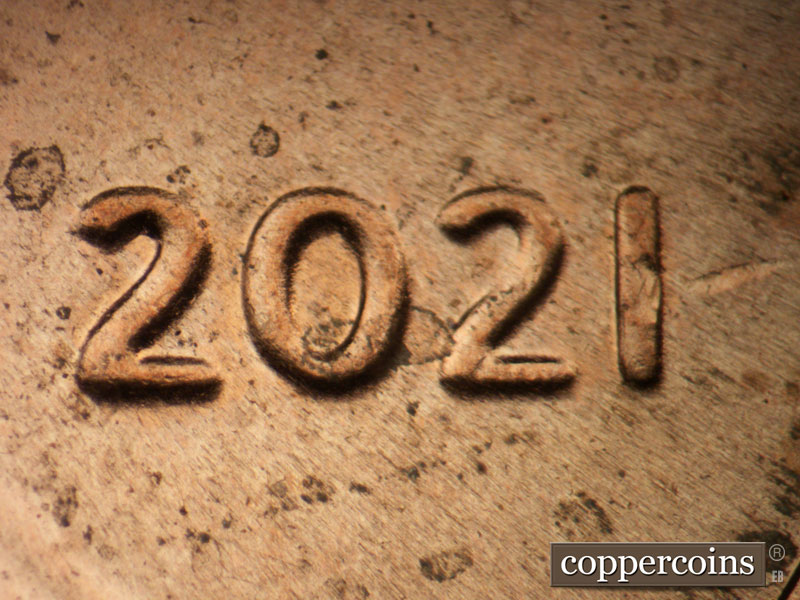 2021 Lincoln cent obverse, CopperCoins die 2021P•1DO•004 — Extra thickness on date.