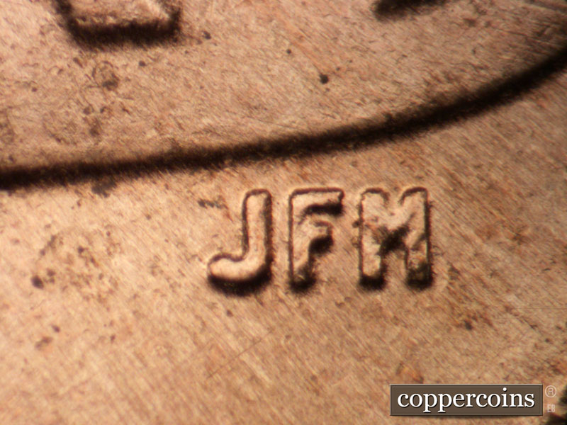 Die-stage A marker on 2021P•1DR•001 showing Light extra thickness on JFM.