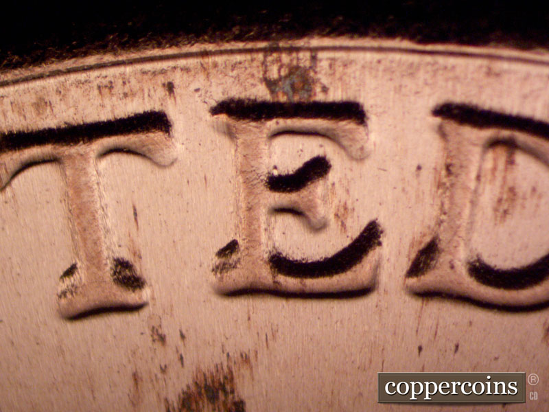 Die-stage B marker on 2022D•1DR•001 showing Doubling on UNITED.