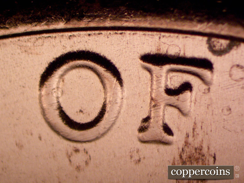 Die-stage B marker on 2022D•1DR•001 showing Doubling on OF.