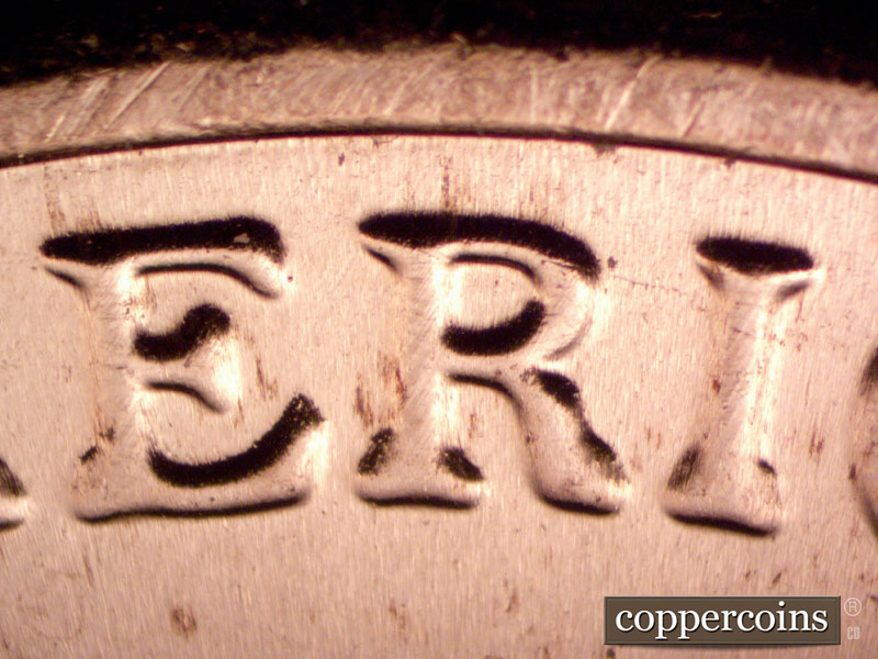 Die-stage B marker on 2022D•1DR•001 showing Doubling on AMERICA.