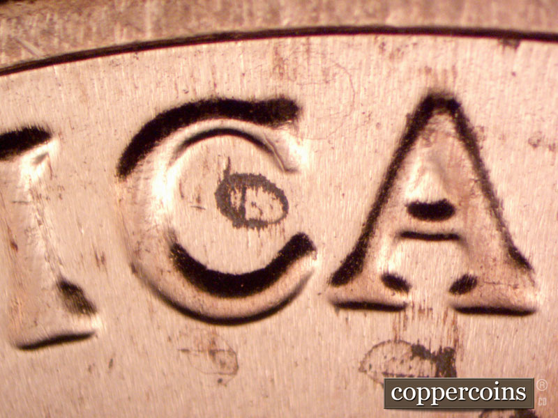 Die-stage B marker on 2022D•1DR•001 showing Doubling on AMERICA.