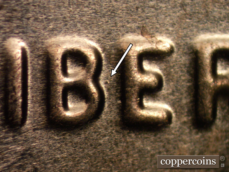 Die-stage B marker on 2024D•1DO•002 showing Die dot between BE in LIBERTY.