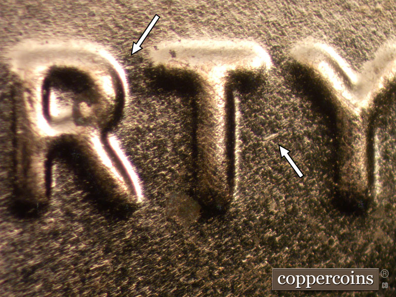 Die-stage B marker on 2024D•1DO•002 showing Small die mark to the right from the top of the R, and a diagonal line to the right of the T in LIBERTY.