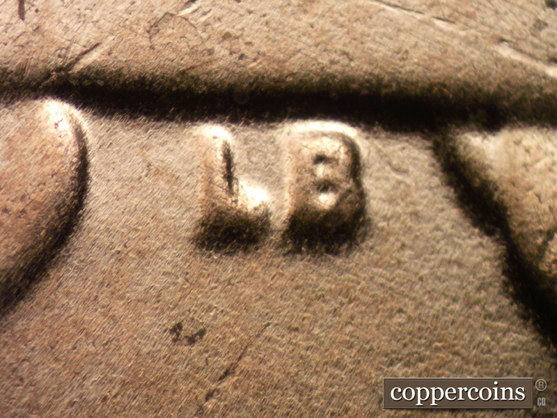 Die-stage B marker on 2024D•1DO•002 showing Extra thickness seen on the LB initials.