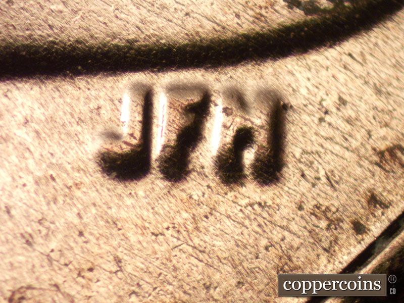 Die-stage B marker on 2024D•1DO•002 showing Extra thickness see on the initials JFM.