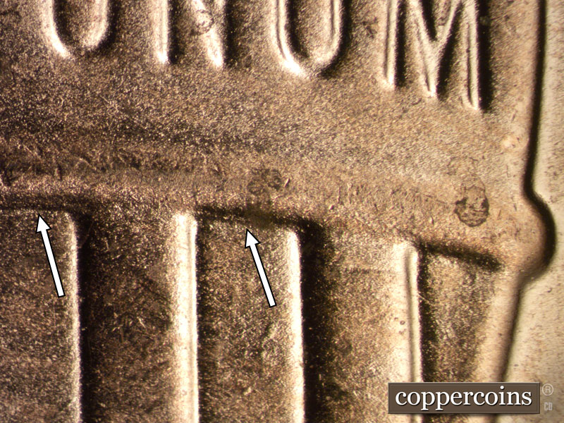 Die-stage B marker on 2024D•1DR•001 showing Extra crown border.