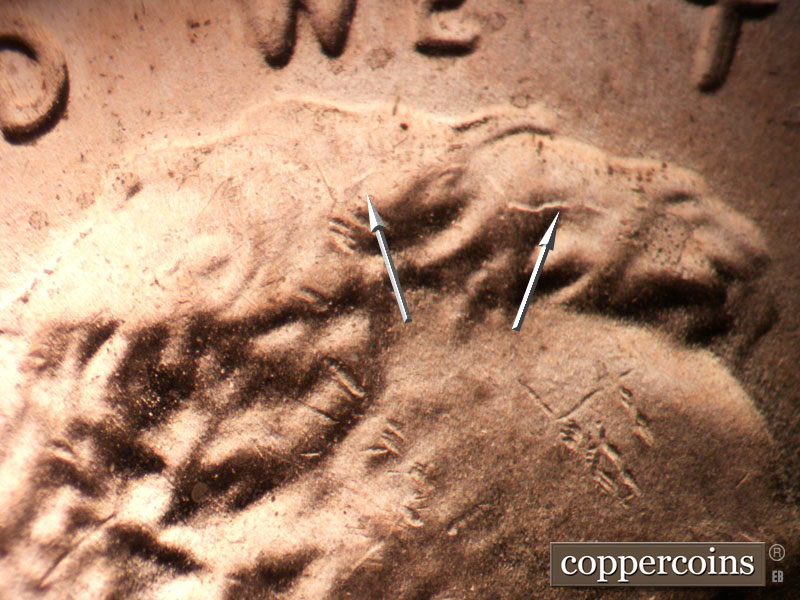 Die-stage C marker on 2024P•1DO•001 showing Die crack in hair.