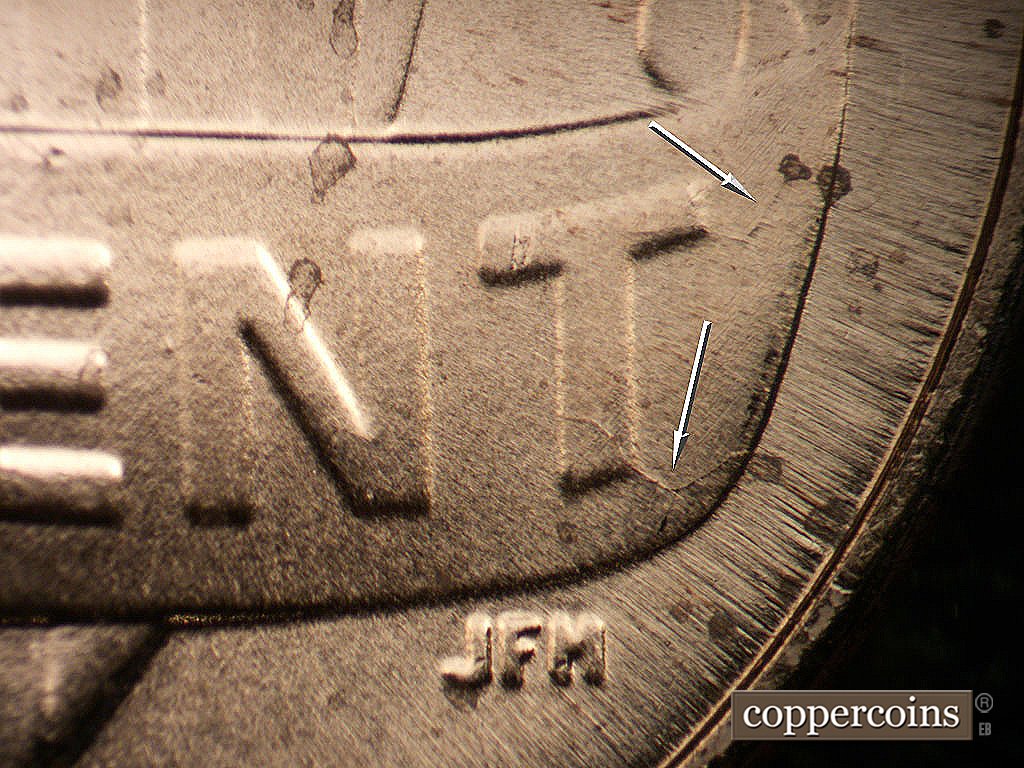 Die-stage B marker on 2024P•1DR•001 showing Die cracks from T in CENT.